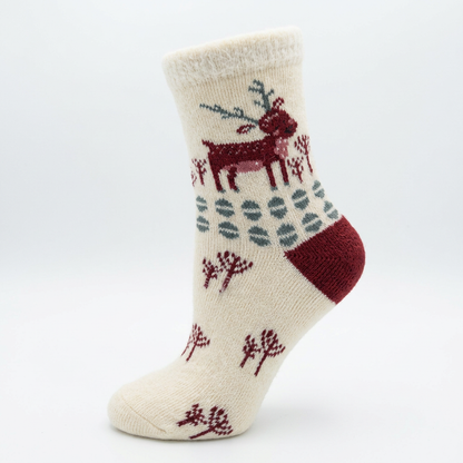 Cremefarbene Wintersocke mit Rentiermotiv als Produktbild